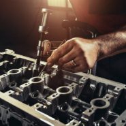 Repairing V10 engine in auto repair shop